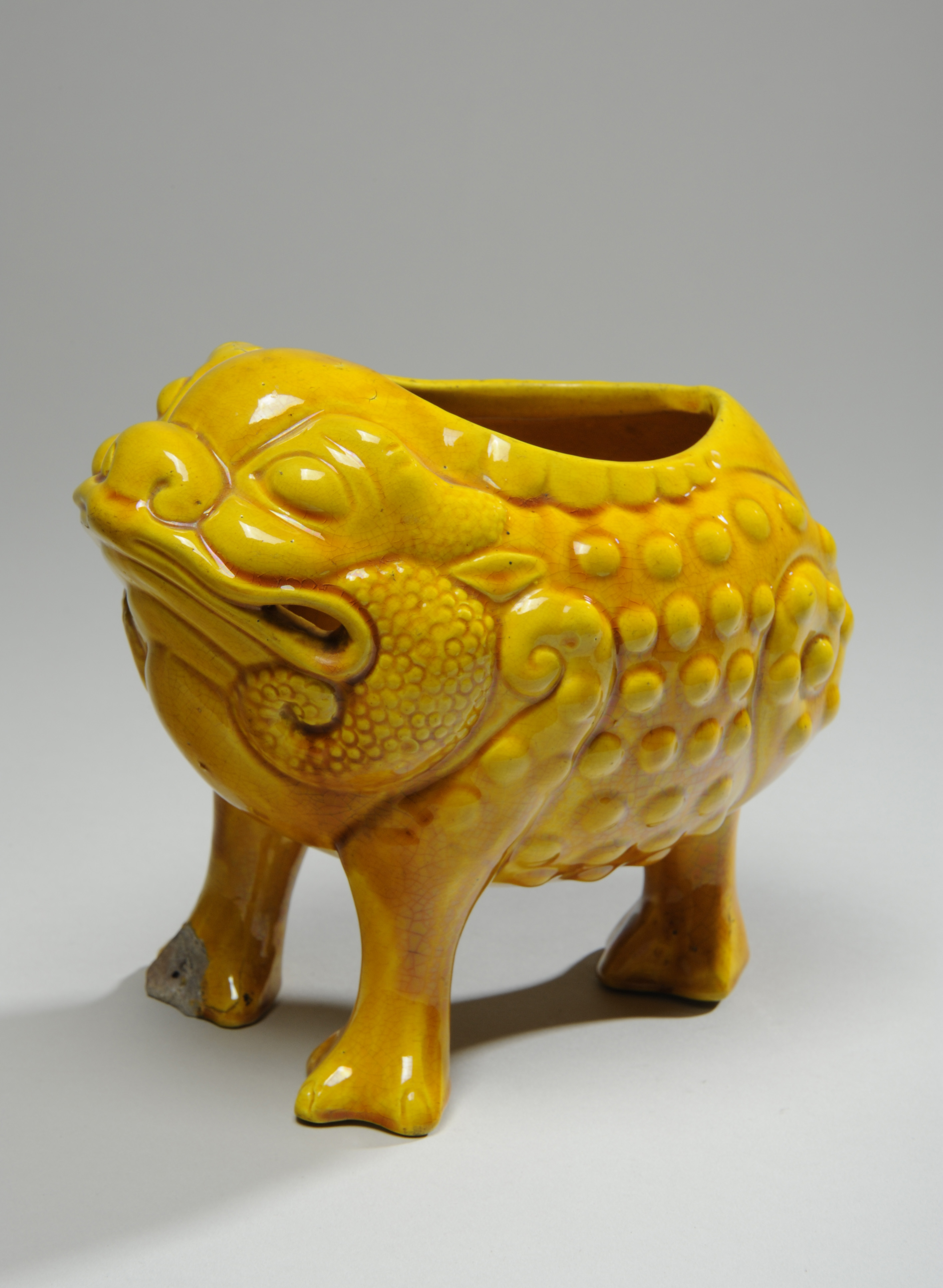 Burmantofts bull frog planter in yellow glazed faience