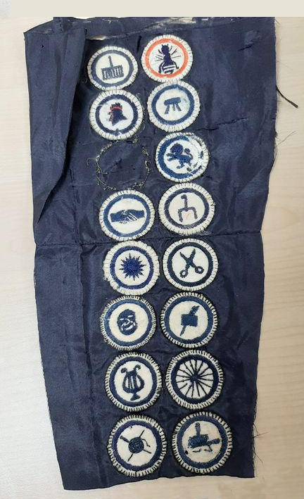 Girl Guide Badges on old uniform sleeve