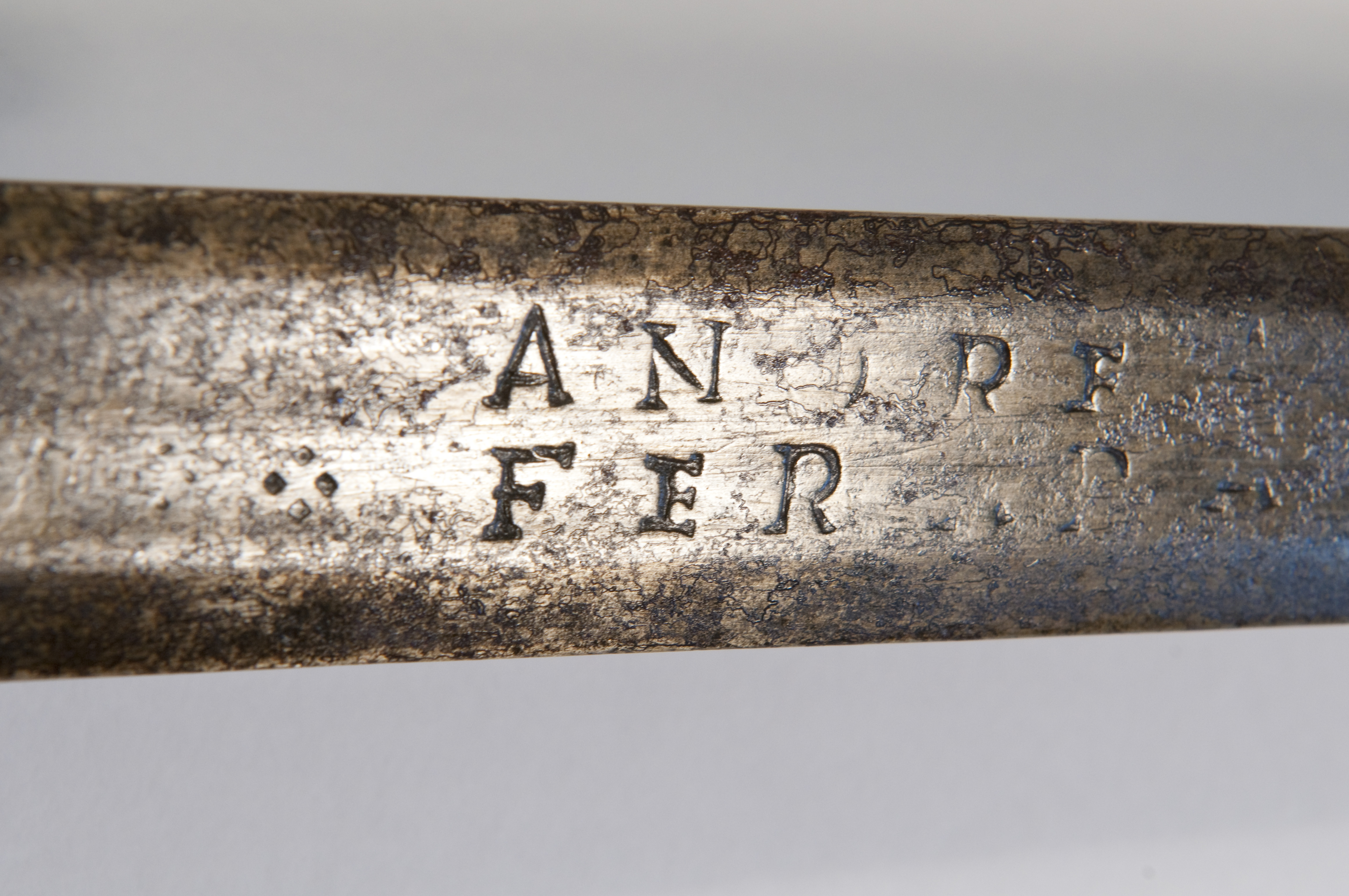 Close up view of Civil War Ferrara sword showing engraved inscription on blade