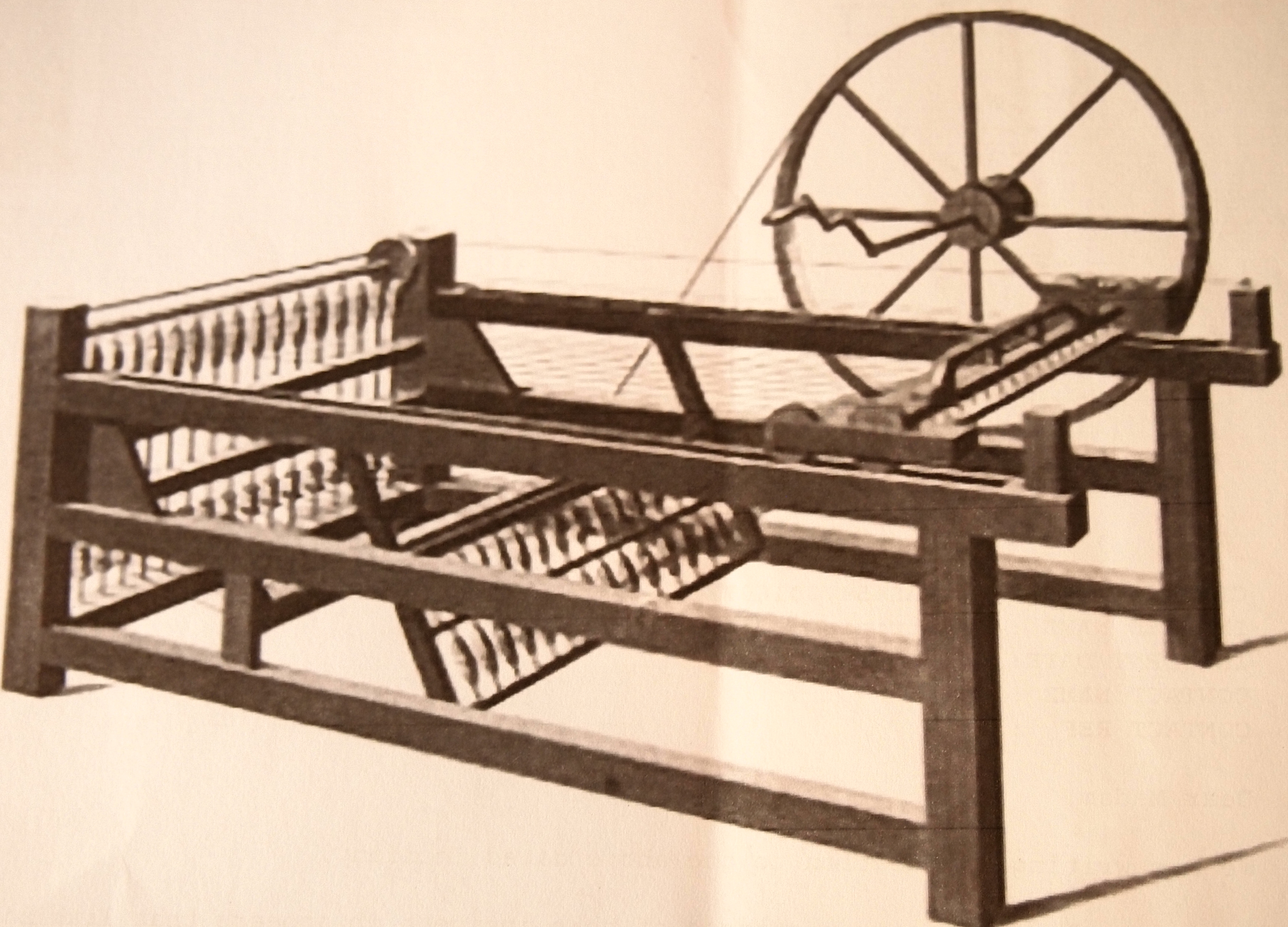 Illustration of a spinning jenny, showing a large wheel on a wooden frame.