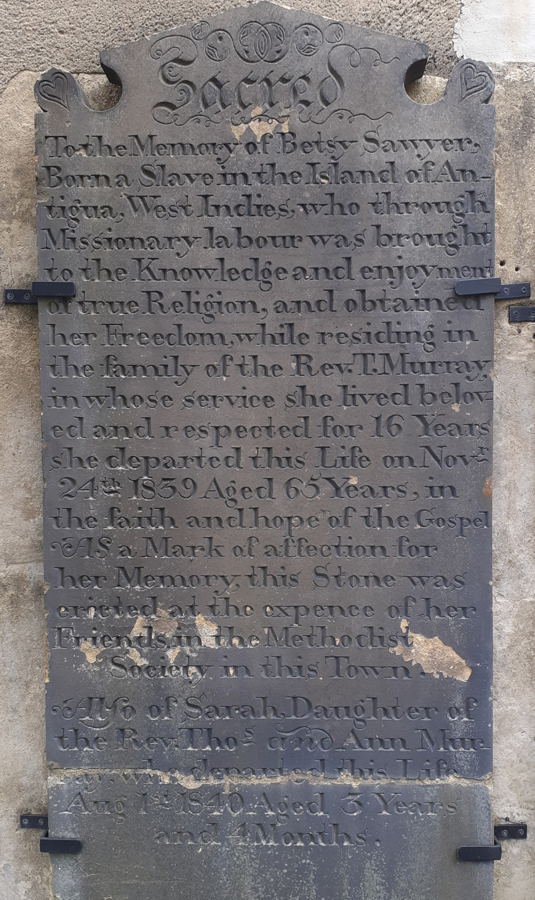 image of a memorial stone to Betsy Sawyer on the side of Yeadon Methodist Church.