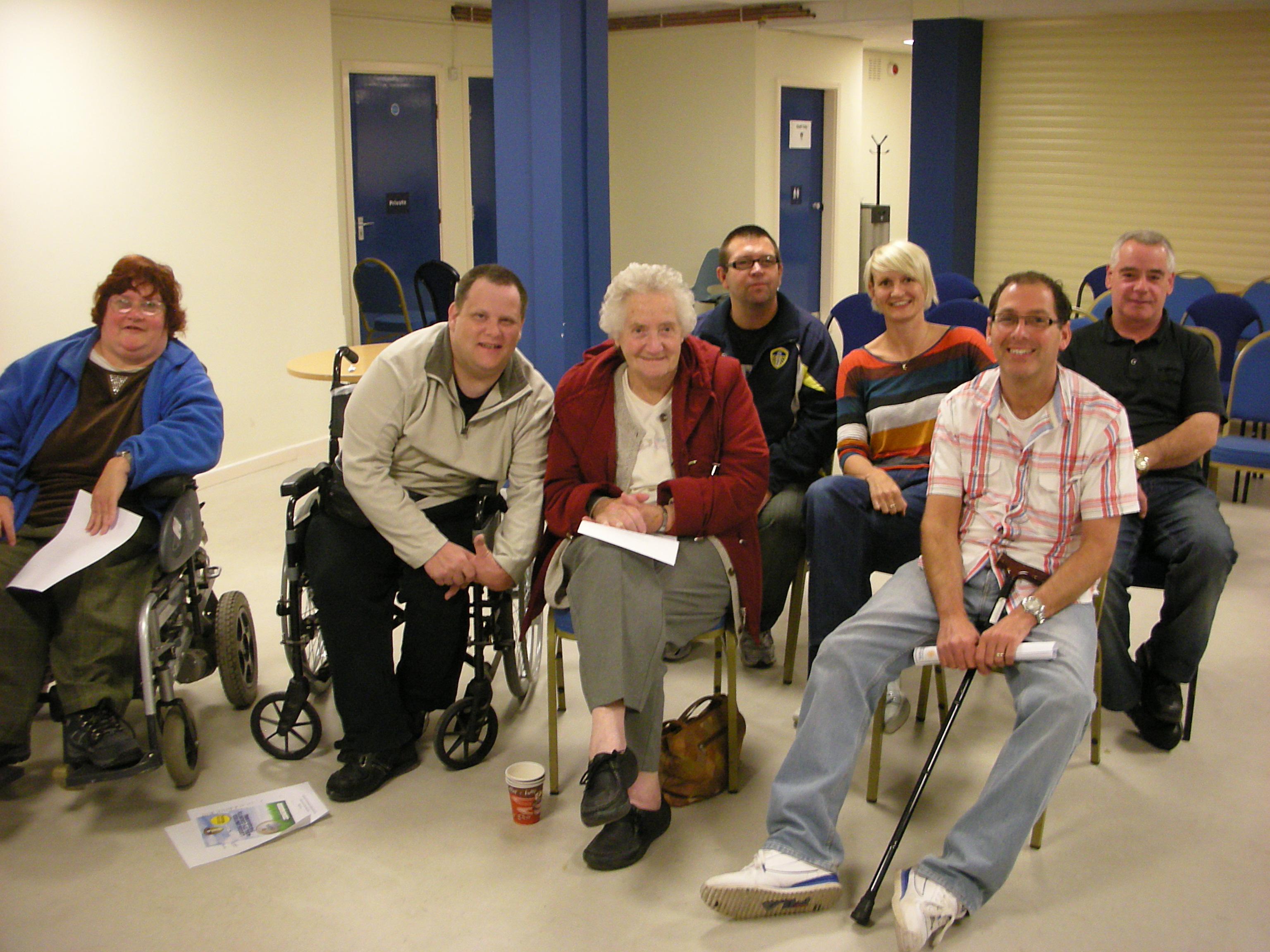 Colour photograph showing members in a meeting