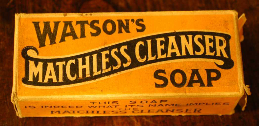 Dark yellow cardboard box with 'Watson's Matchless Cleanser Soap'