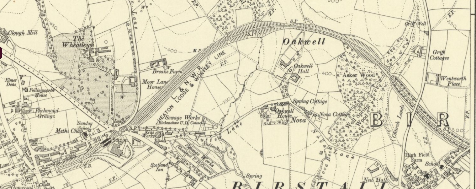 Vintage map depicting the area around Oakwell, featuring labelled roads, buildings, and wooded areas.