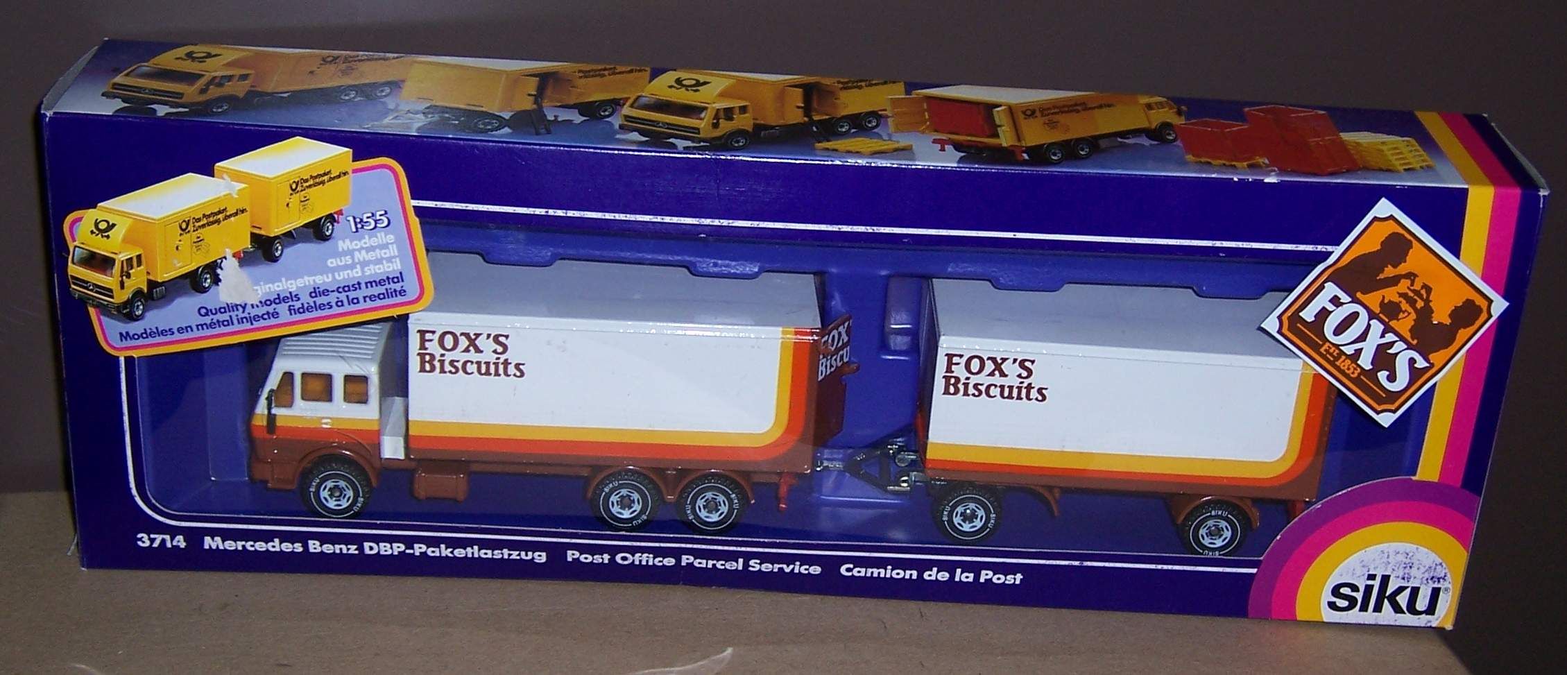 Boxed toy model of a Mercedes Benz post office parcel service truck, branded with "Fox's Biscuits." The packaging is colourful and features product illustrations.