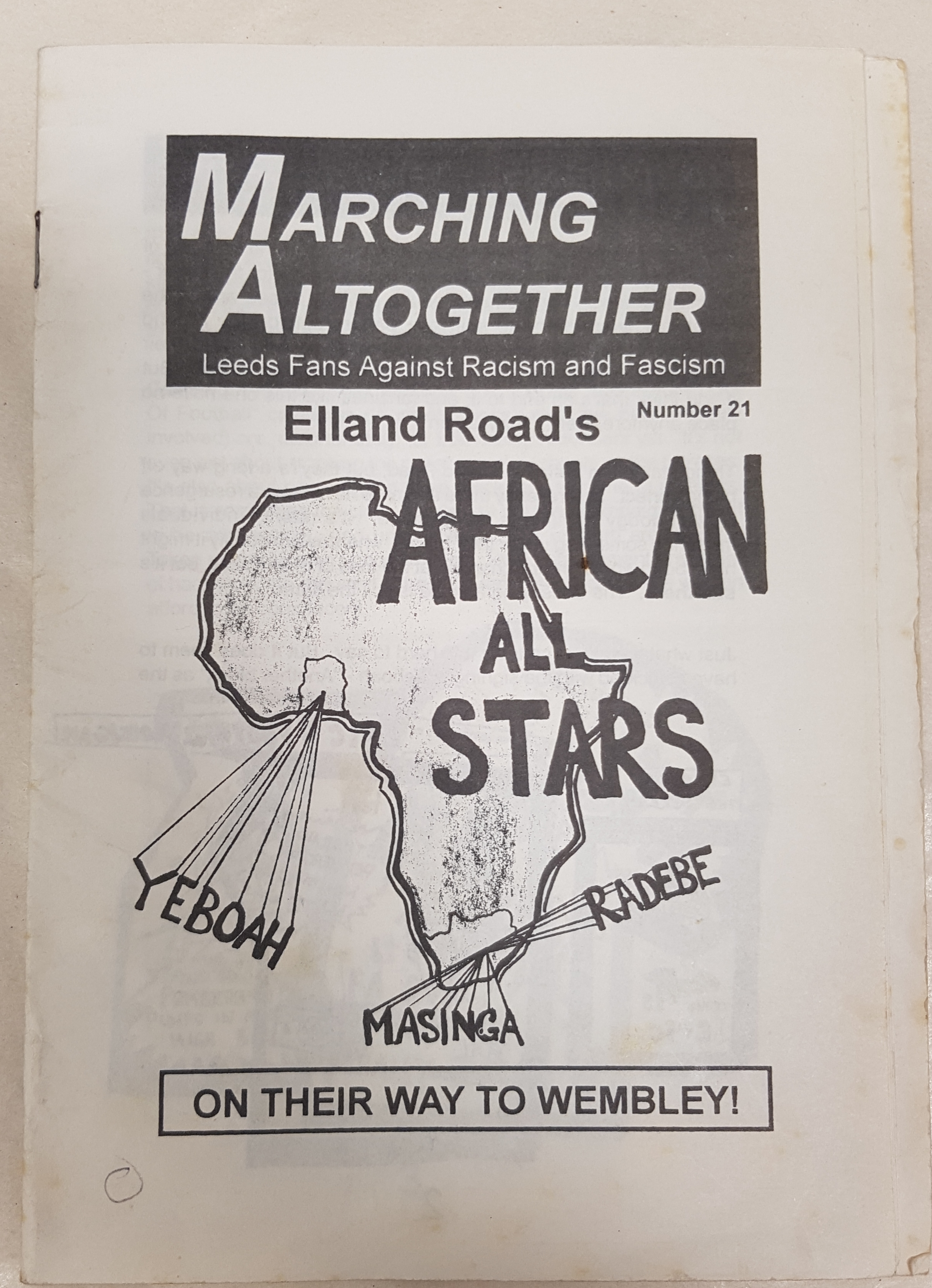 Photograph of the front of a fanzine with 'African All Stars' on the front, a map of Africa and the names of the Leeds players that come from there