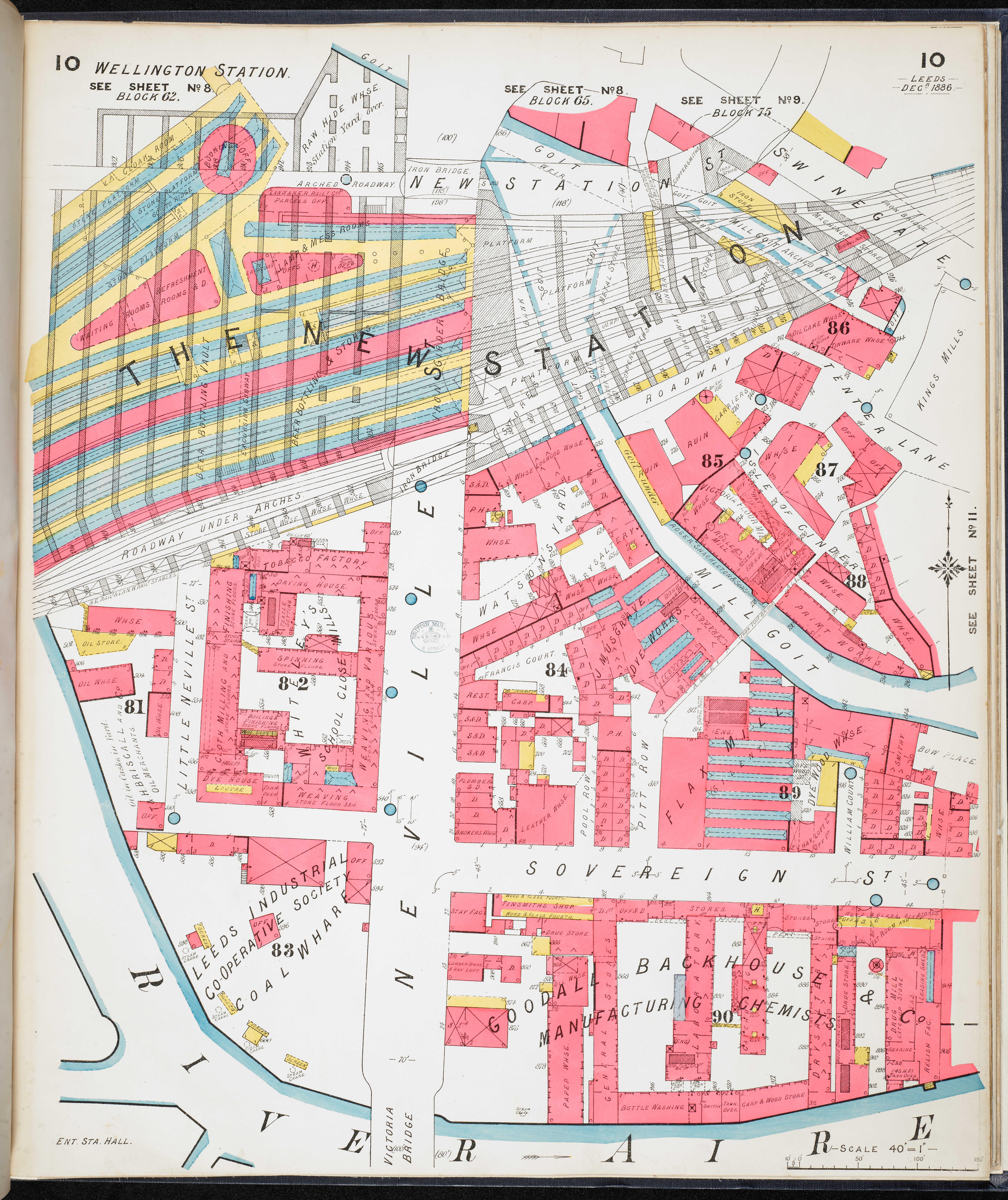 Map drawing of Wellington Station and train tracks above the top half pained in yellow and blue . In the bottom half of the map are surrounding streets in Leeds. Buildings are painted in pink.