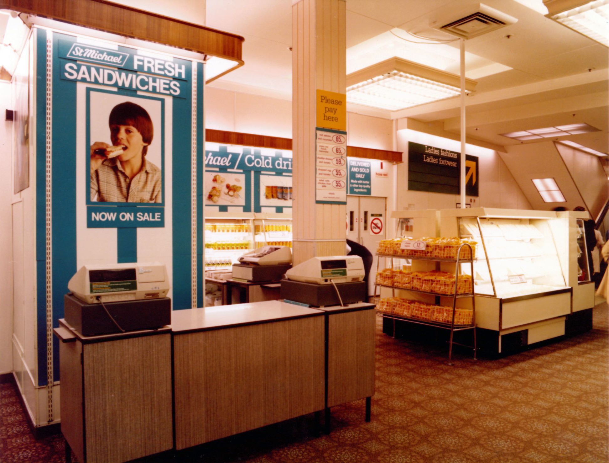 Colour photograph showing a display of sandwiches for sale
