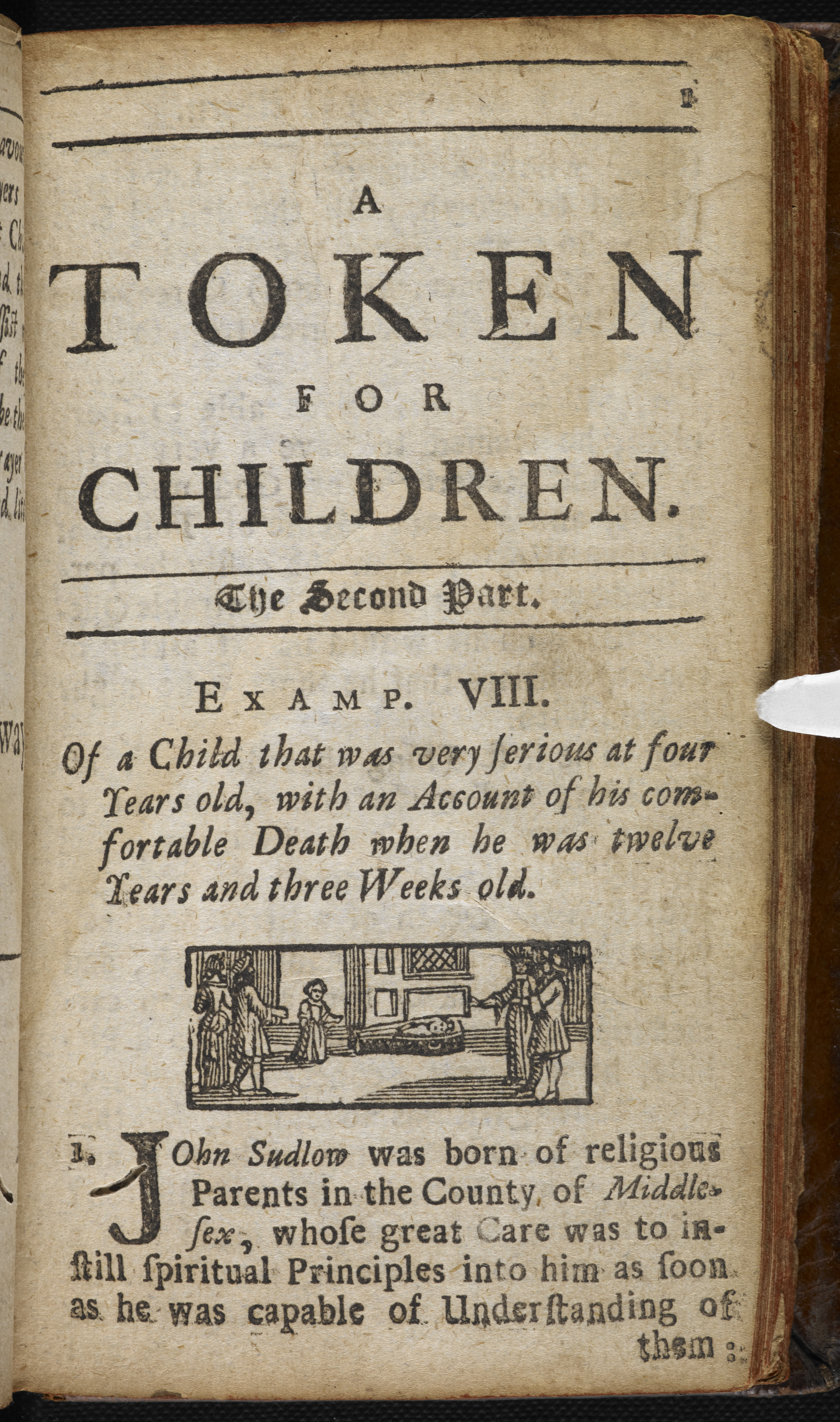 Page from a printed book with a picture of adults and a child in a room.