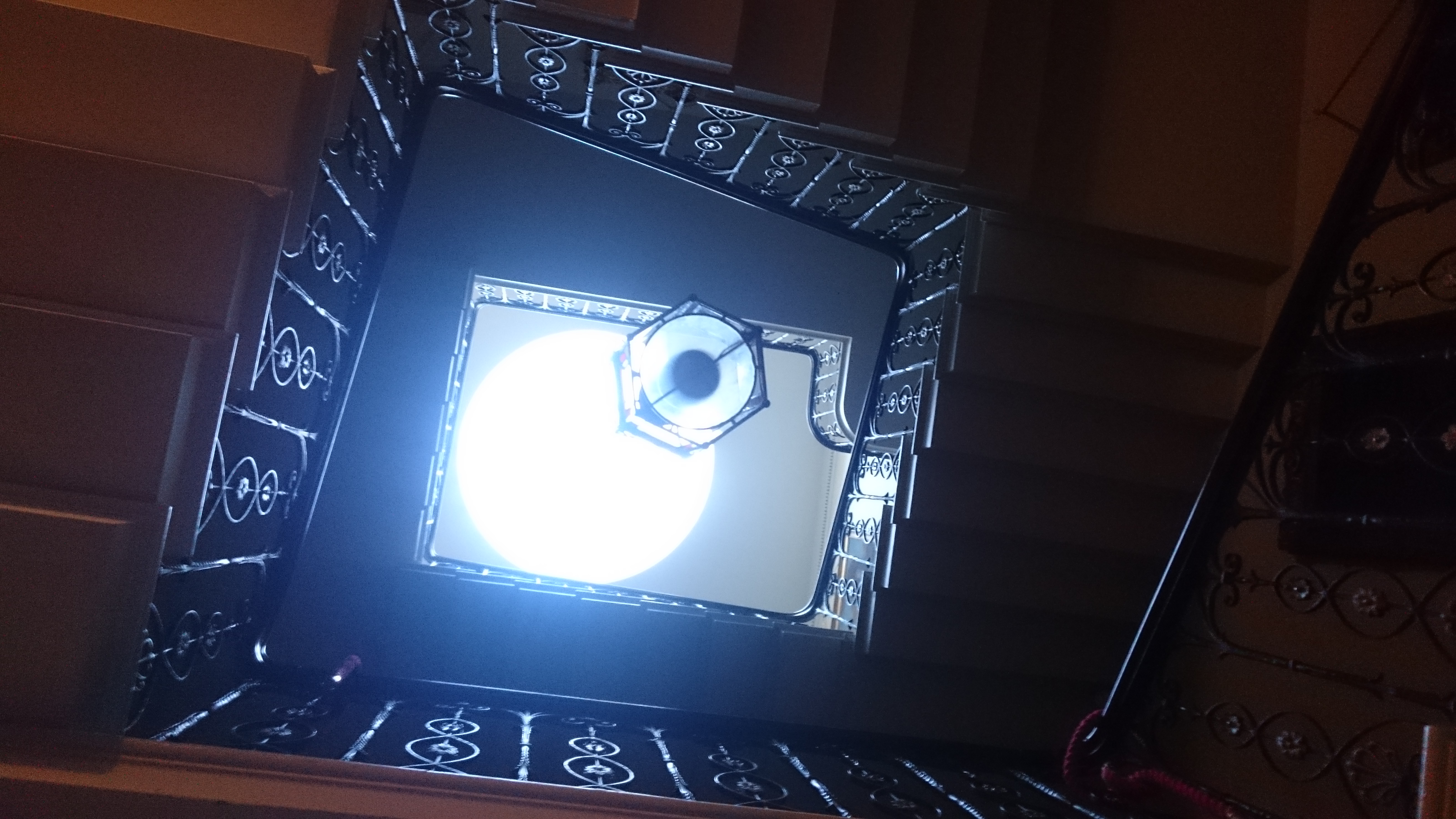 Recent photograph showing a view from the top of the stairs looking down .