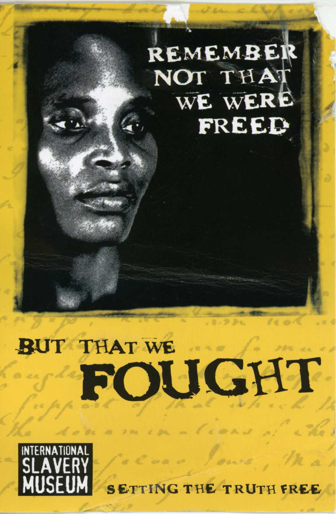 Postcard with a picture of a black woman and the words 'Remember not that we were freed, but that we fought' written on it