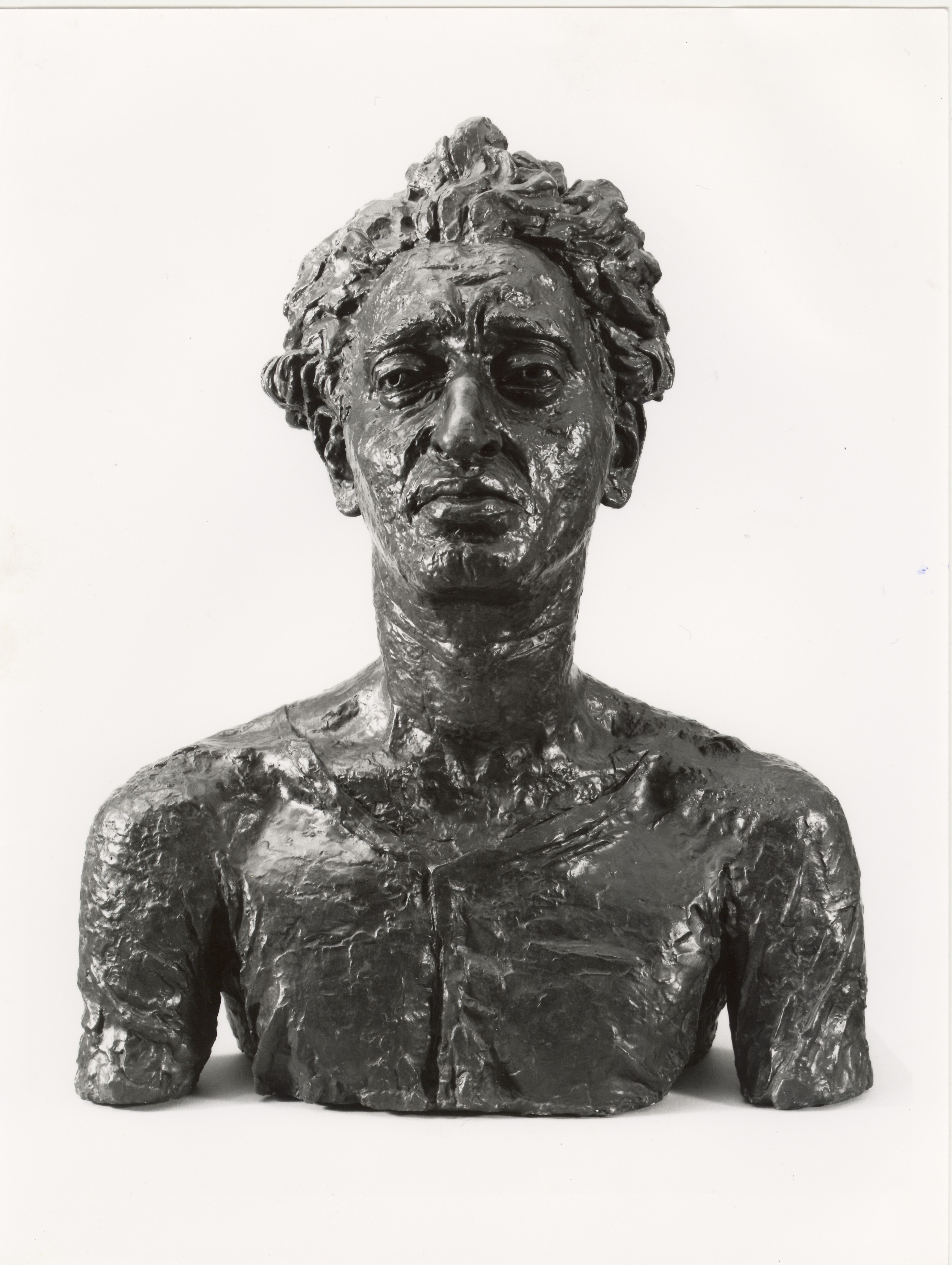 Bust of Jacob Kramer by Jacob Epstein, 1921, a head and shoulders bronze bust of a man with tousled hair.