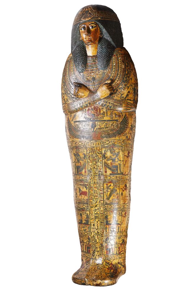 Outer coffin lid showing the painted face of Nesyamun.  Carved with his arms crossed over his chest and decorated with hieroglyphs.
