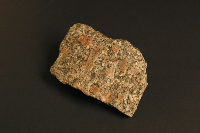 A sample of granite showing its black, white and grey crystal structure