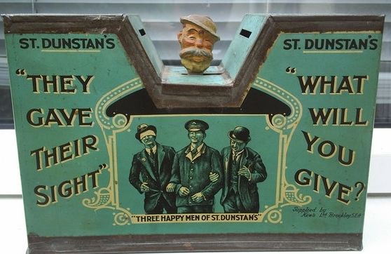 Collection box belonging to the charity St Dunstan's (now Blind Veterans UK)  It says 'They gave their sight.  What will you give?"