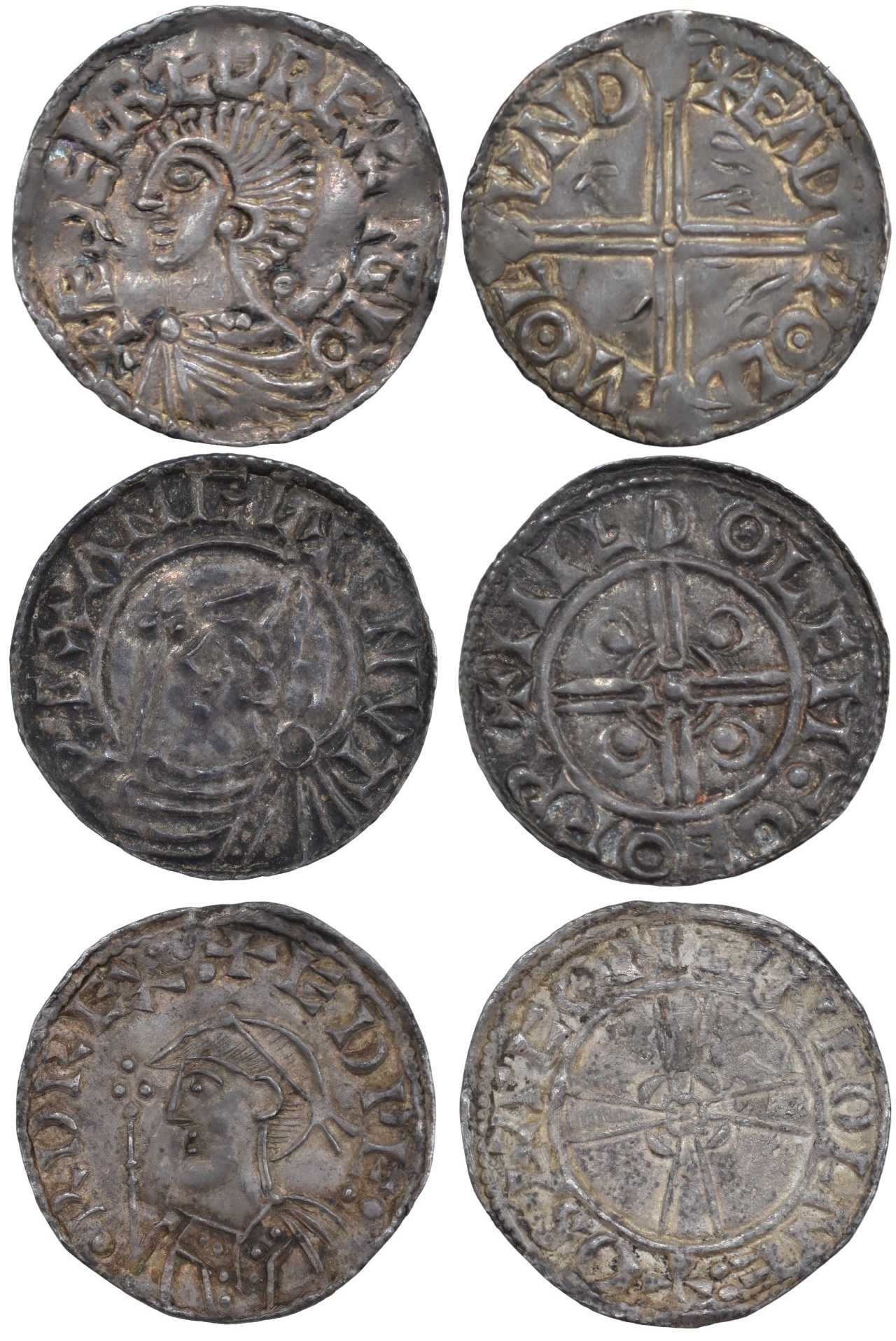 Images of three Viking-age coins featuring intricate designs, with images of the front and back. Each pair shows a human profile on one side and a cross or abstract pattern on the other.