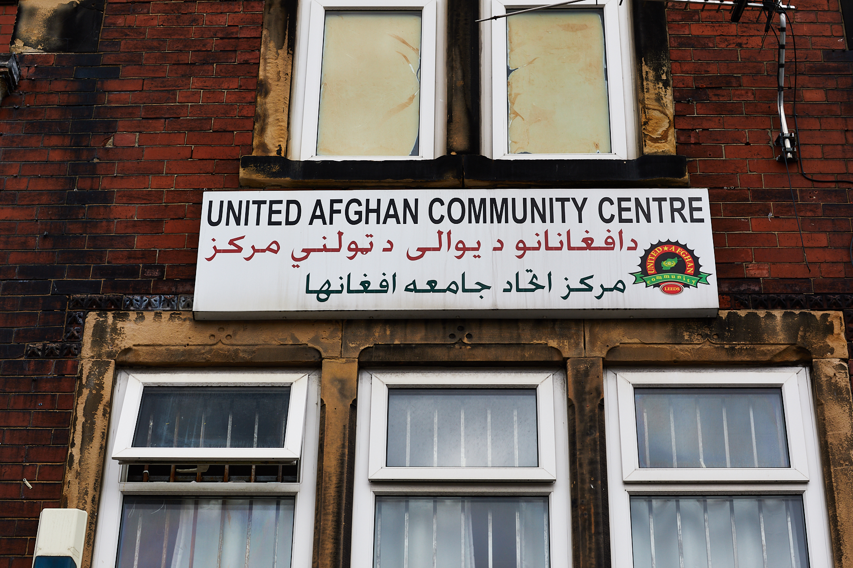 Sign above windows at United Afghan Community Centre, Leeds 2019