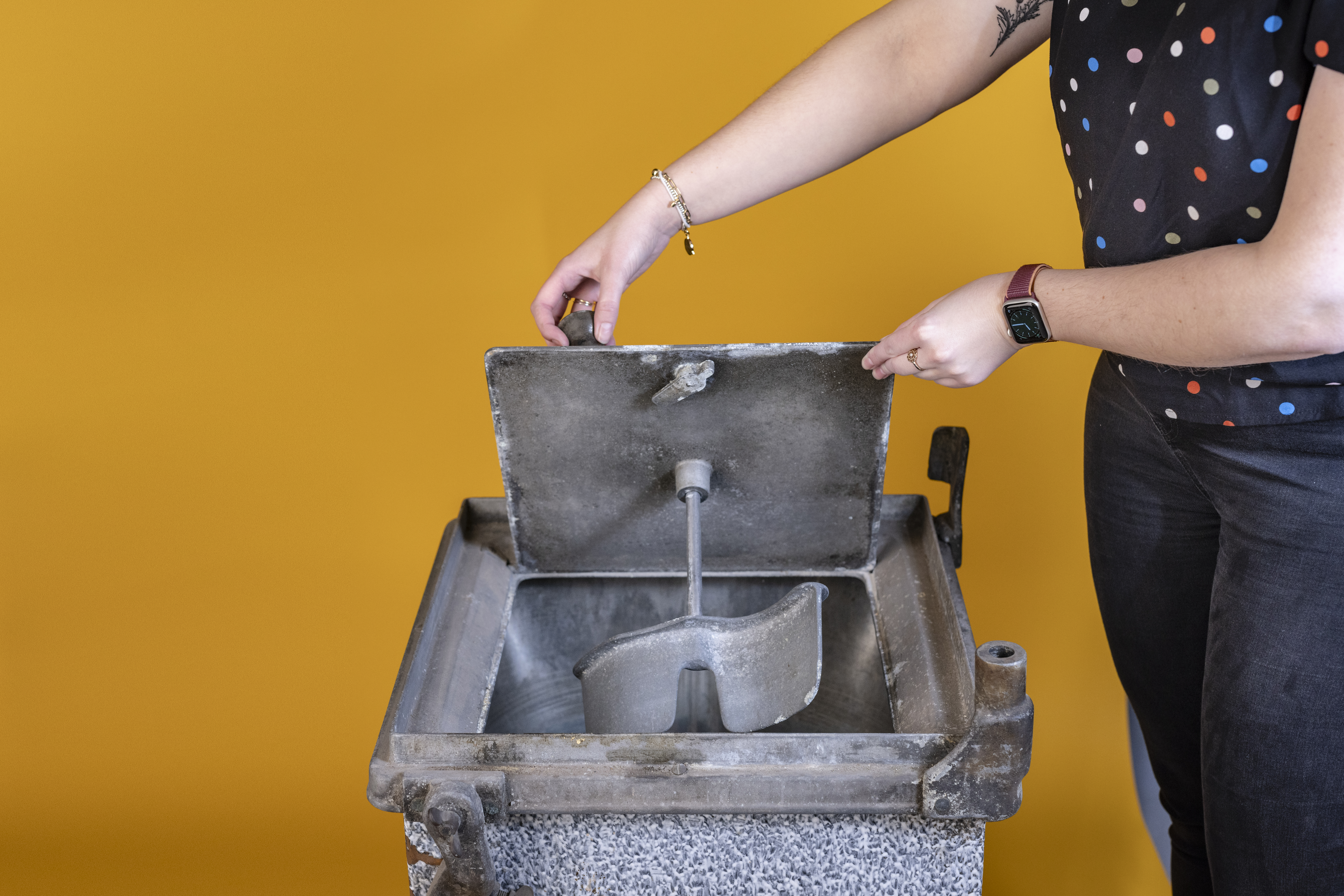 Photograph showing the paddle inside a hand crank washing machine
