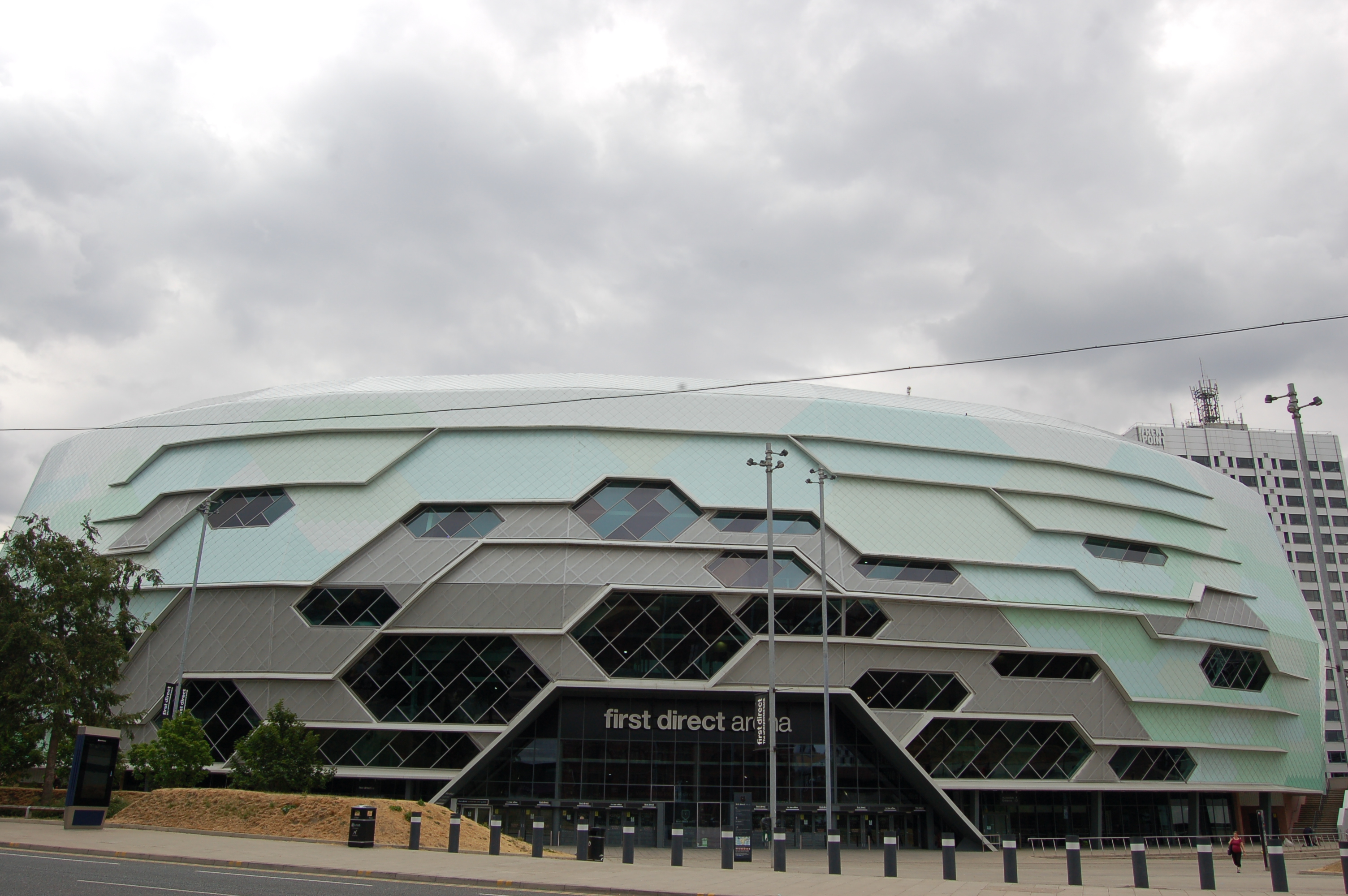 Contemporary photograph of Leeds Arena.  The building is a fan shape.