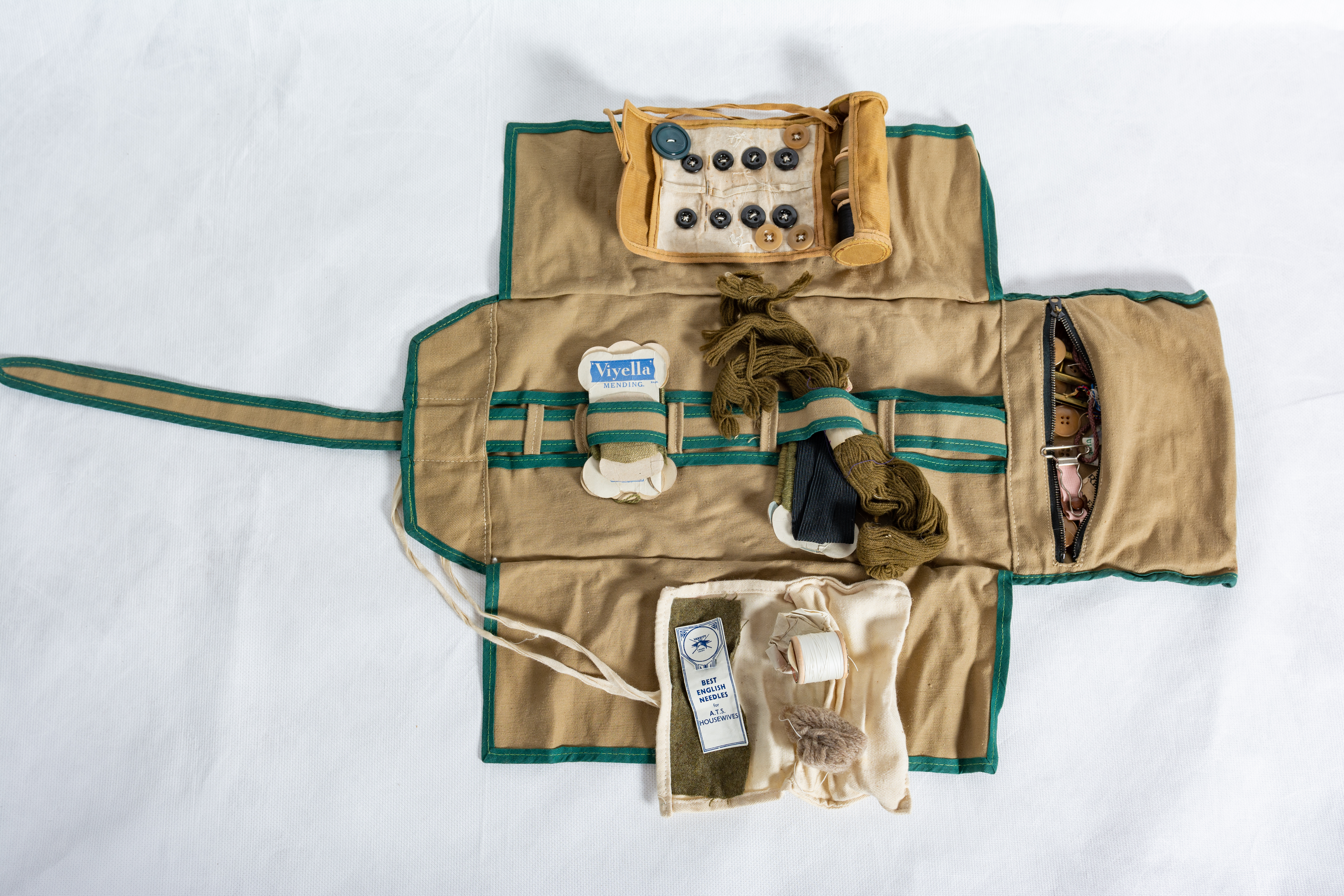 WW2 Girl guide sewing kit with roll opened up to show contents