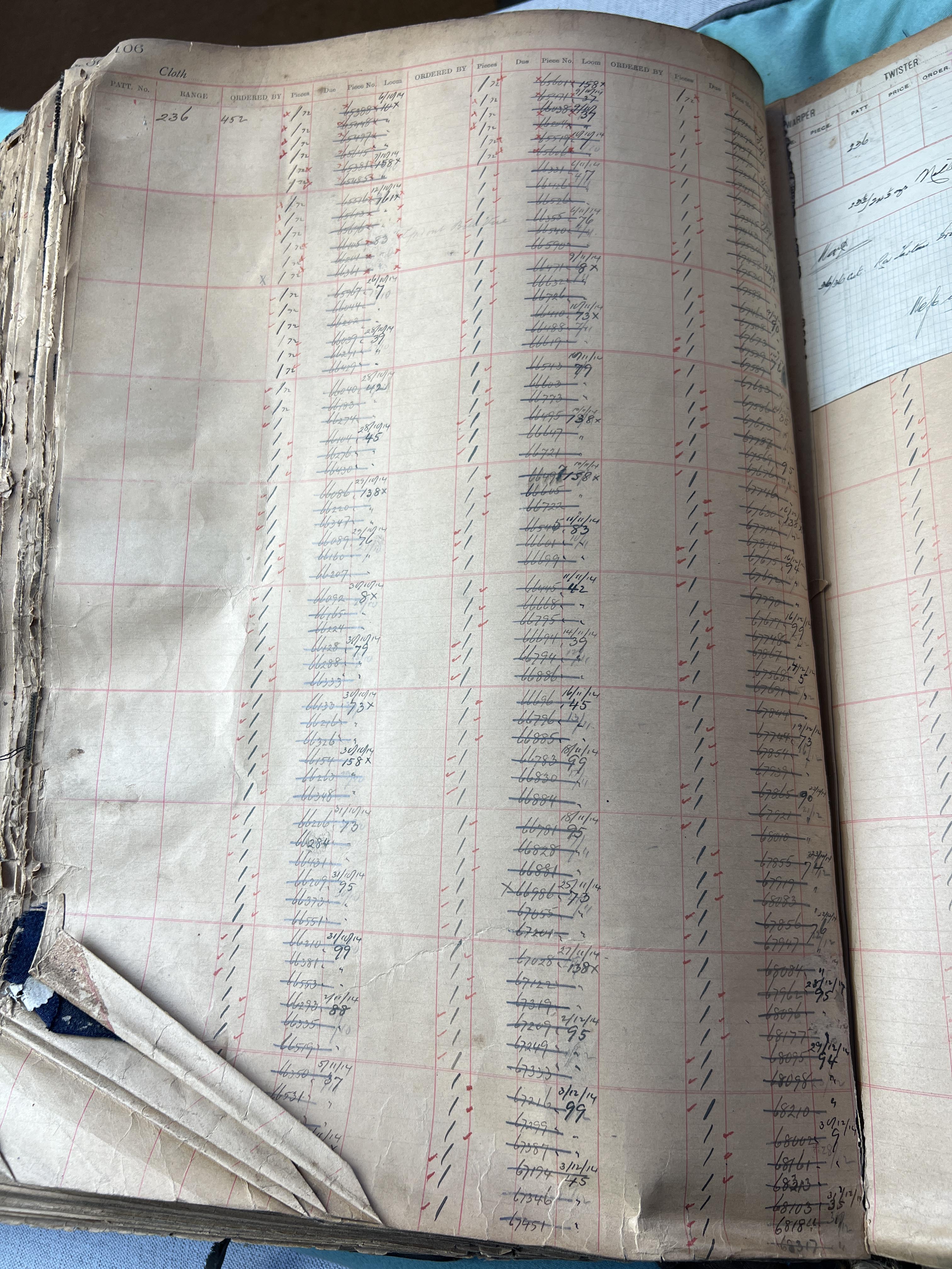 Ledger book with numerous hand-written entries