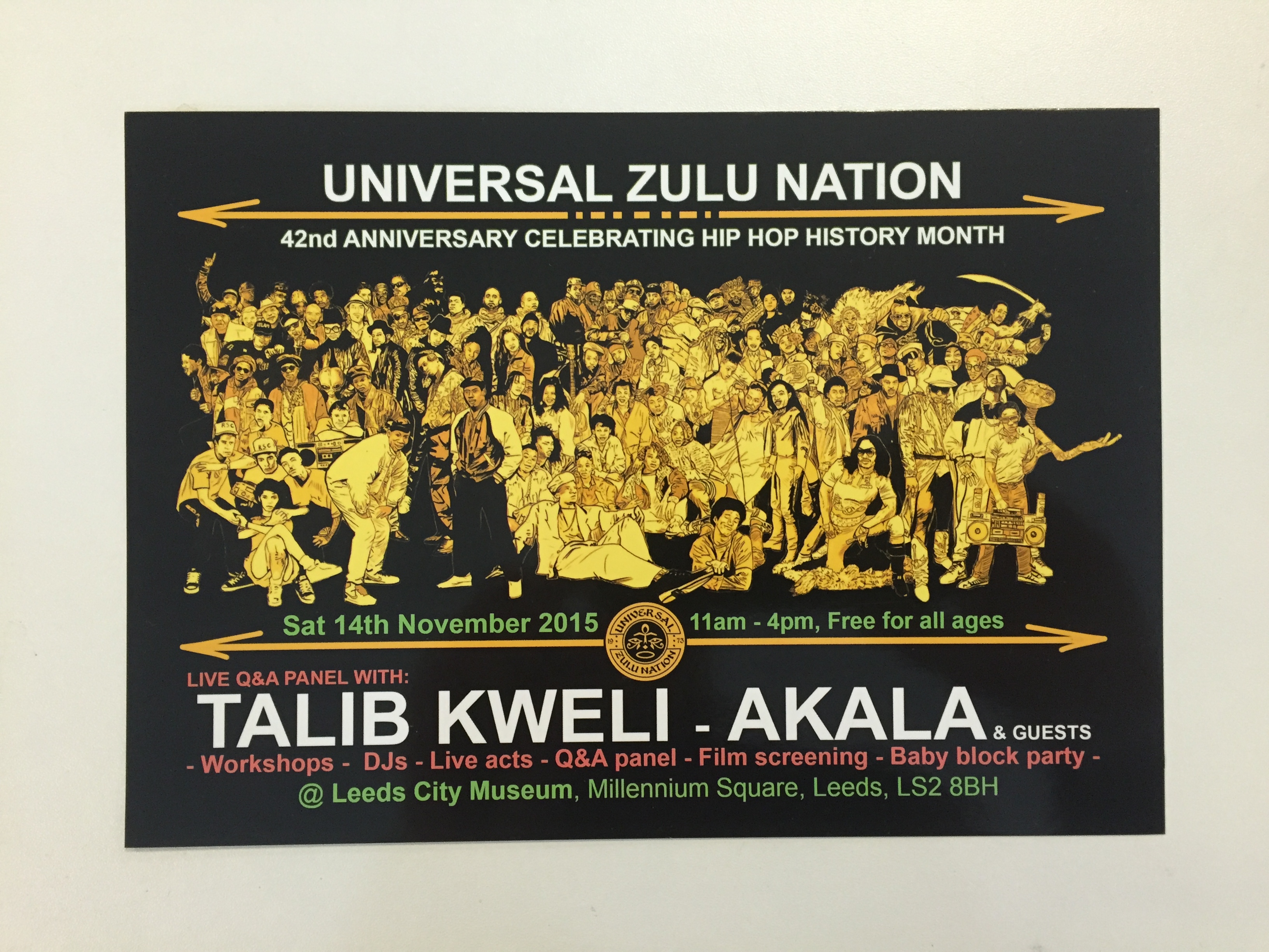 Black flyer with illustration of people in gold and 'Uniersal Zulu Nation' written across the top