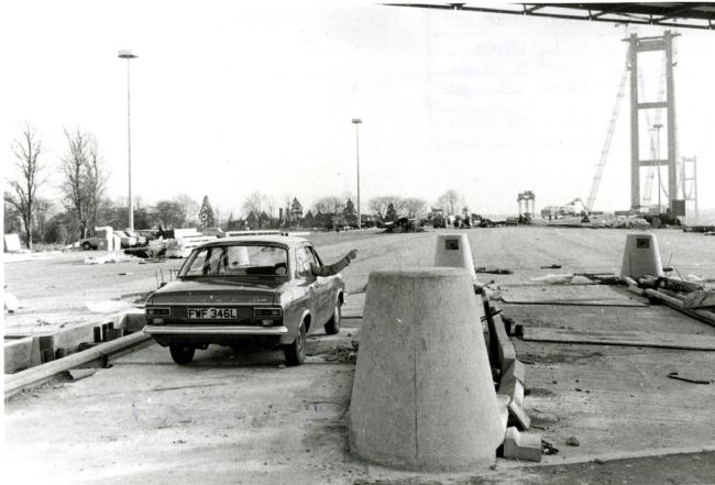 Car in the Toll Area of the Humber Bridge under construction, November 1977
