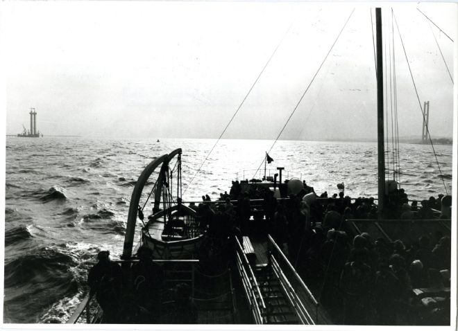 View of the Humber Bridge under construction, taken from the paddle steamer ferry on the Humber estuary, May 1977