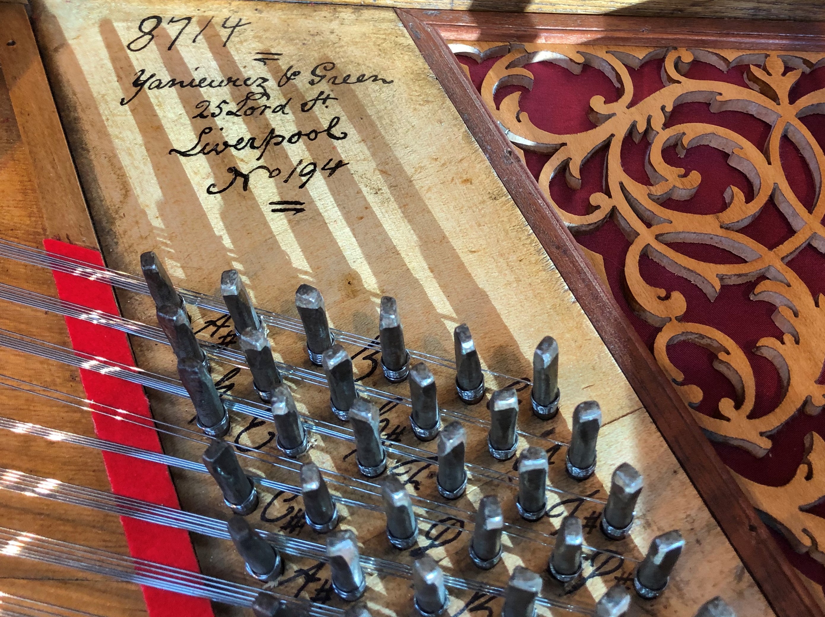 Inside the case of a square piano where the  piano is signed ‘8714 Yaniewicz & Green, 25 Lord Street, Liverpool, 194’