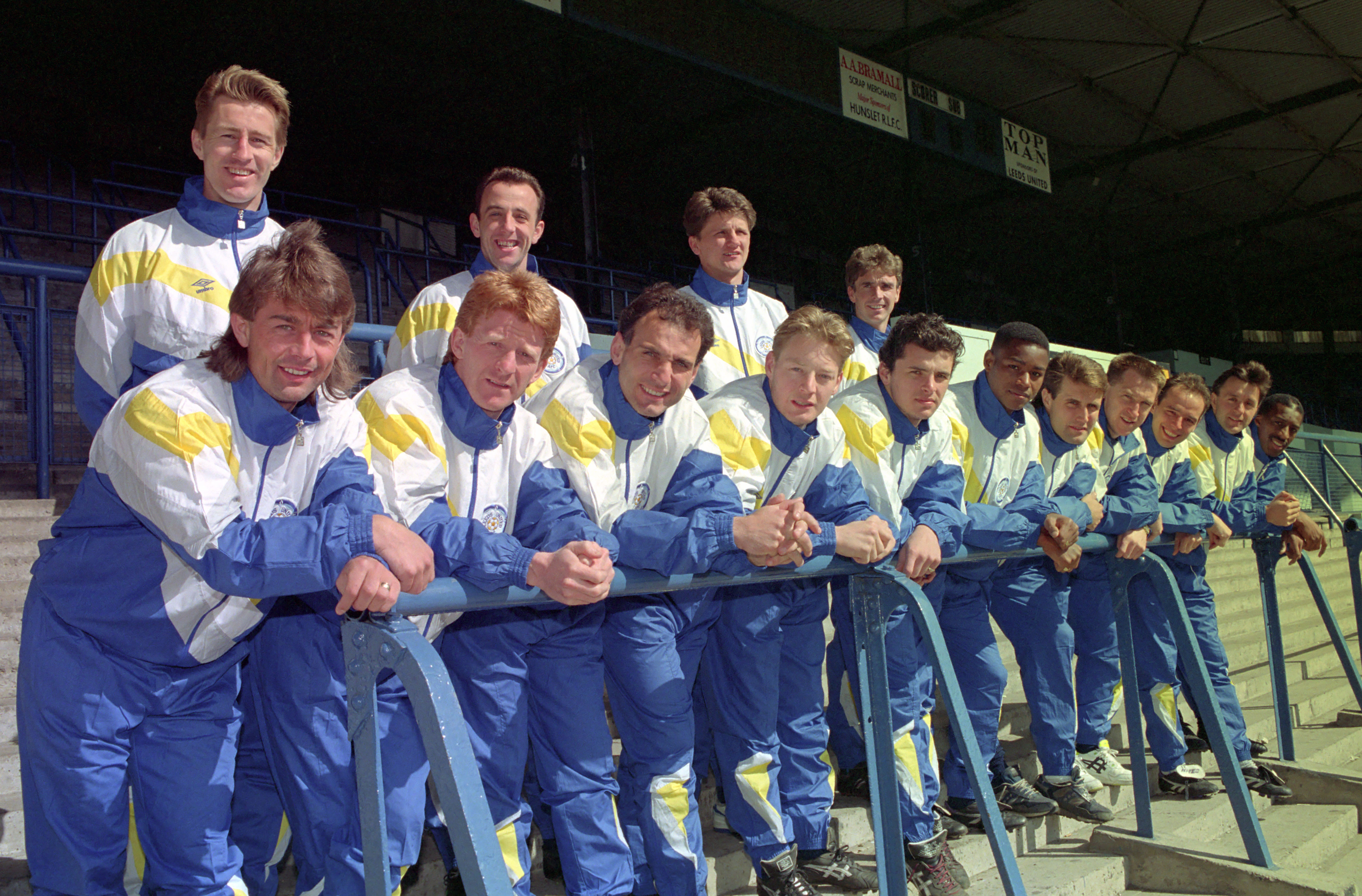 Leeds United team in 1990 wearing tracksuits in the blue and yellow colourway