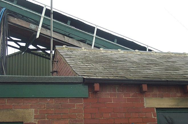 Roof of a building with slate tiles.