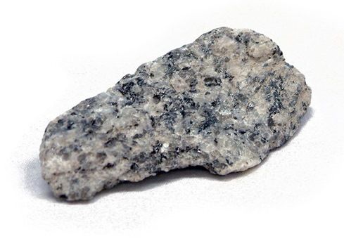 Mottled granite with large crystals that can easily be seen.  Crystals are black and white and light grey in colour.