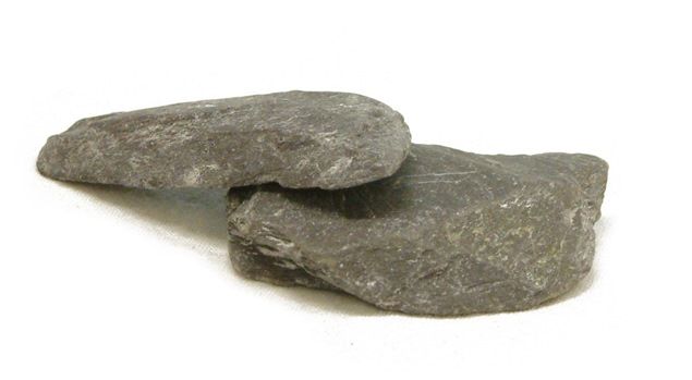 Two pieces of slate, dark grey in colour with some lighter grey flecks
