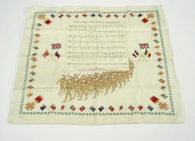 Commemorative handkerchief covered with the song lyrics and music for ‘It’s a Long Way to Tipperary’ along with an illustration of marching soldiers