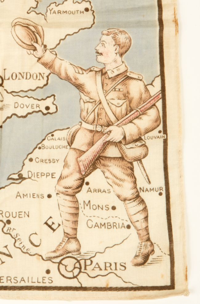 Image of a soldier on a printed handkerchief against a map of France