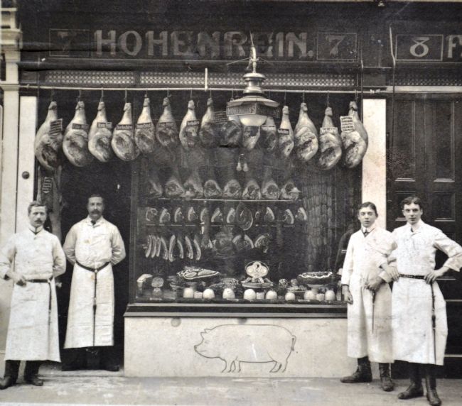 Charles Hohenrein standing in the doorway of his pork butchers' shop at 7 Waterworks Street, Hull, with his staff in about 1910