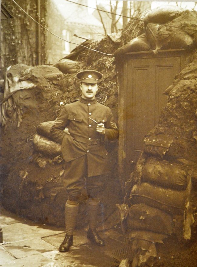 Photograph of Charles Henry Ross (previously Charles Hohenrein) standing in air raid shelter at Derringham Street, Spring Bank, Hull