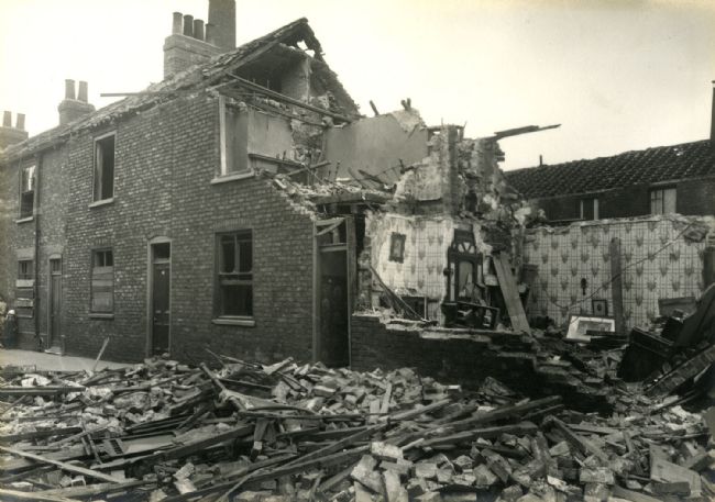 Photograph showing damage caused to Waller Street in Hull by a Zeppelin raid on 6 June 1915
