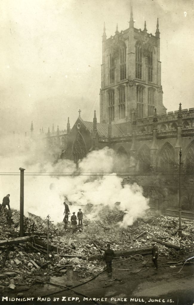 Photograph showing damage caused by a Zeppelin raid on Market Place in Hull on 6 June 1915.