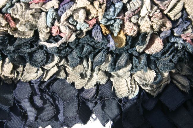 Detail of a rug made with old rags