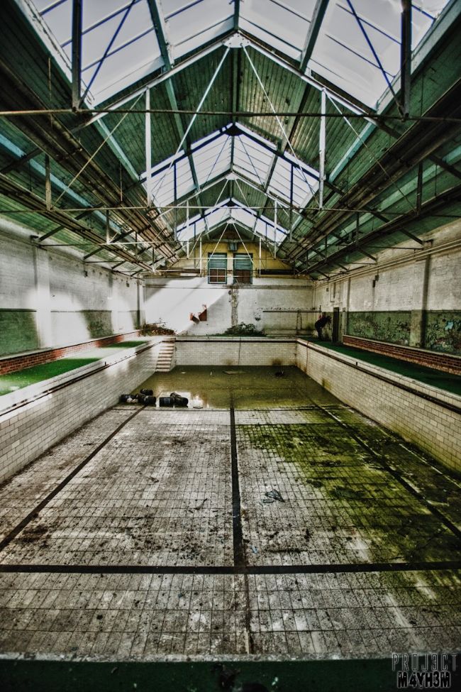 An empty and derelict swimming pool