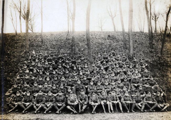 Photo of survivors of 10th Battalion, Yorkshire Regiment (the Hull Commercials) at St Omer in December 1918