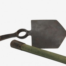 Entrenching tool head and helve. Standard entrenching tool, top of helve bound in blackened metal band; helve handle light wood painted light green.