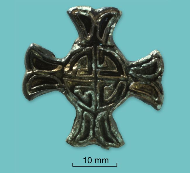 Anglian cross brooch in copper alloy and enamel