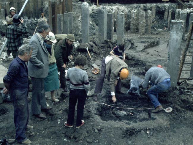 Archaeologists excavate the helmet in Coppergate, York