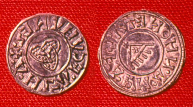 Viking coins stamped with a ‘triquetra' design on the left, Viking banner design on the right