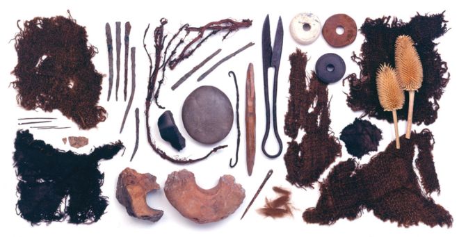 Artefacts related to textile production in Viking-occupied York: fragments of excavated textile, iron needles, a slick-stone, fragments of clay loomweights, a bone pin-beater, shears, spindle-whorls, teasels.