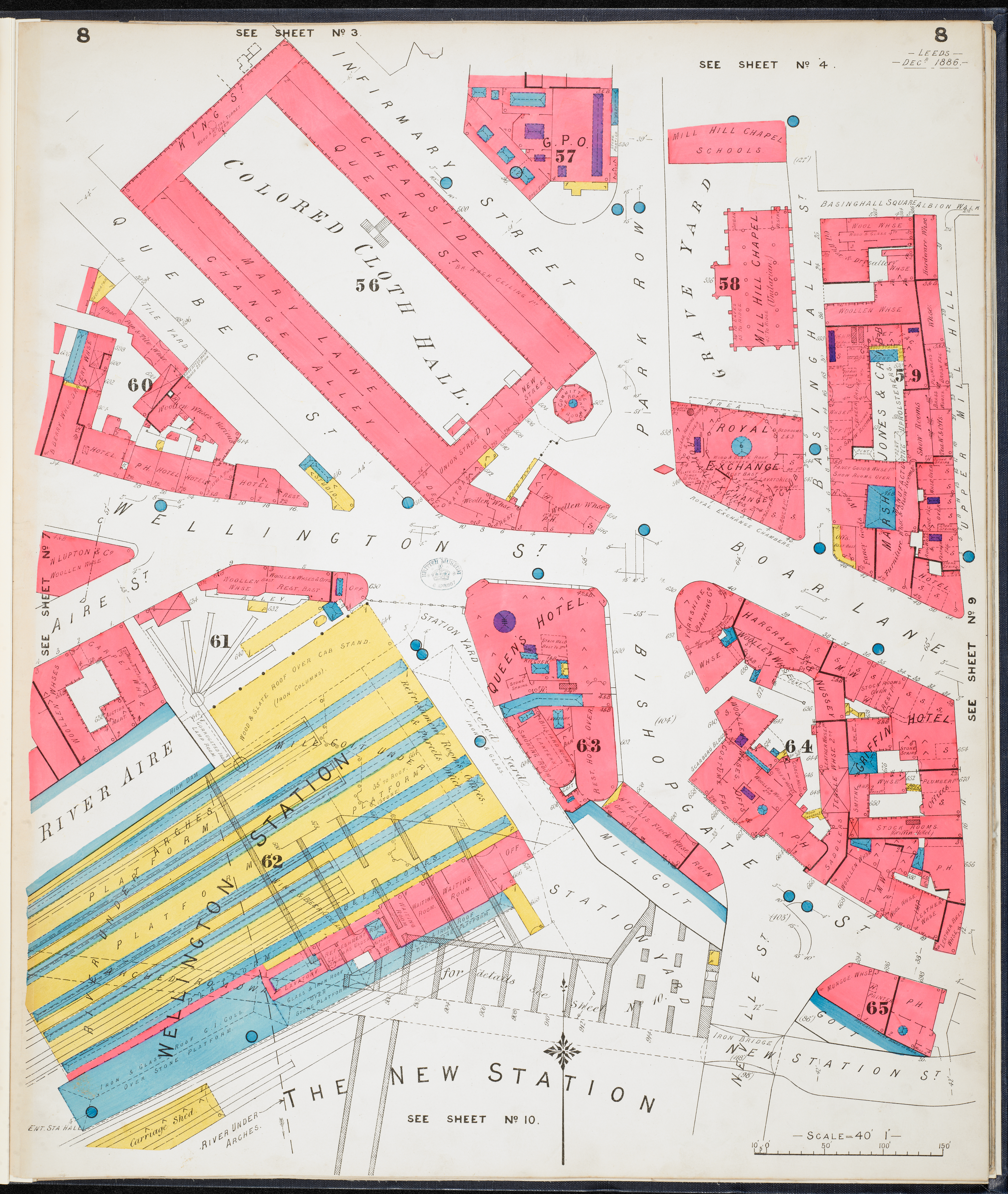 Map drawing of Wellington Station and surrounding streets in Leeds. Buildings are painted in pink. The station is pained in yellow with blue stripes.