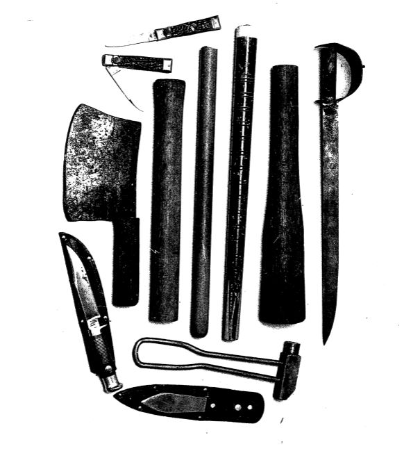 Photograph of weapons found included in letter to ACPO from Greater Manchester Police regarding incident on a coach where people dressed as Manchester United fans were carrying weapons to a game.  Then inlcude koshes, a meat cleaver, a sword and several knives.