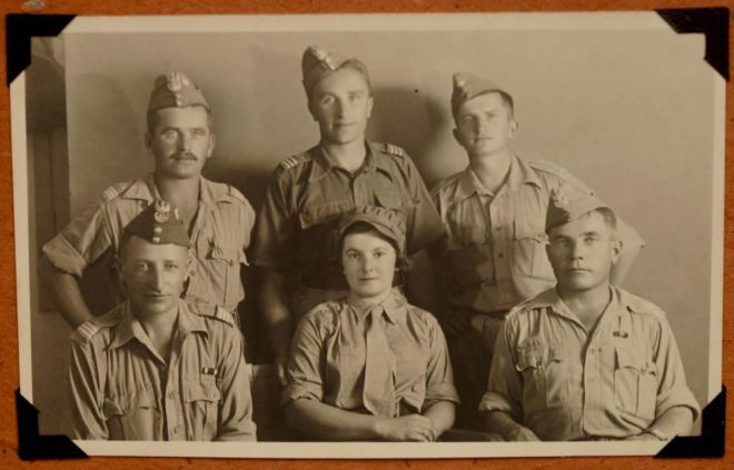 Black and white photo of Lola and Romek and three friends in Polish army uniform, 1942